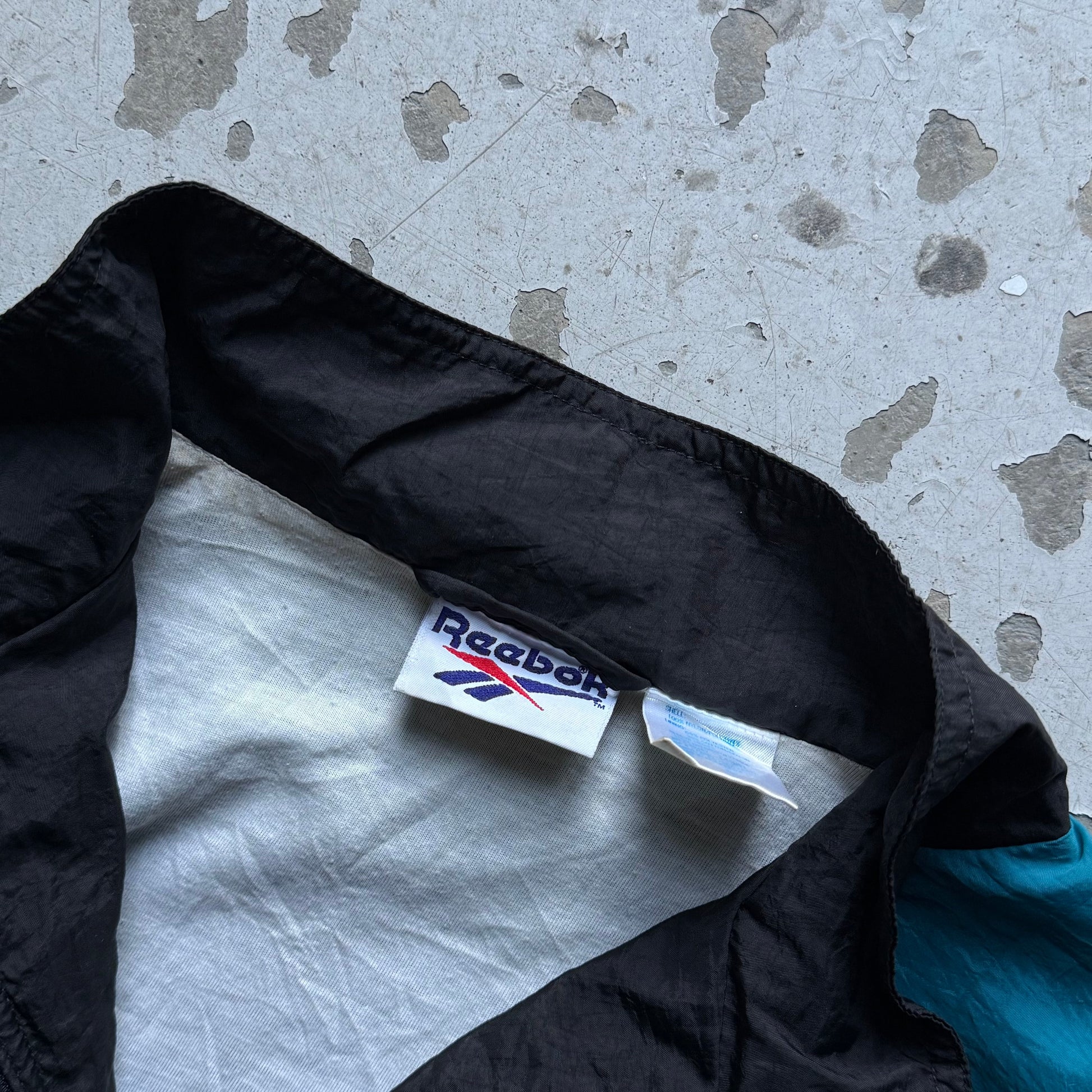 Reebok Vintage Track Jacket Sort/Blå/Hvid (L) – 90’er Windbreaker - Re:Junk Vintage